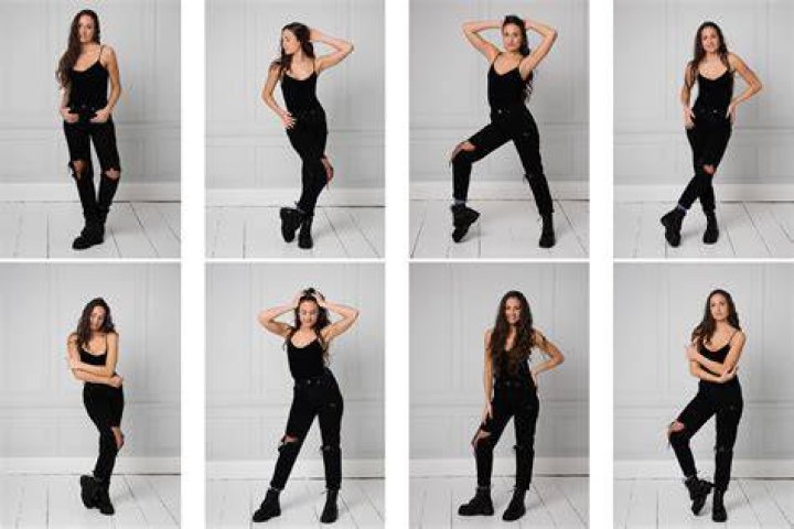 a woman posing for a photo with her hands on her hips