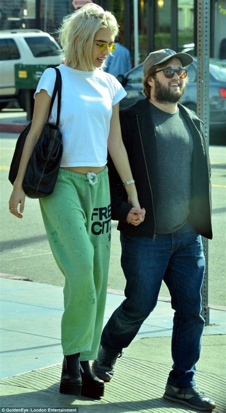 Haley Joel Osment holds hands with statuesque girlfriend on LA stroll