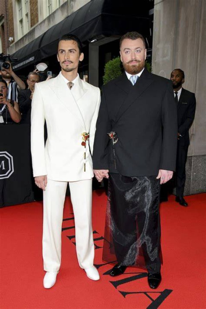 Sam Smith holds hands with rumoured boyfriend Christian Cowan trends now